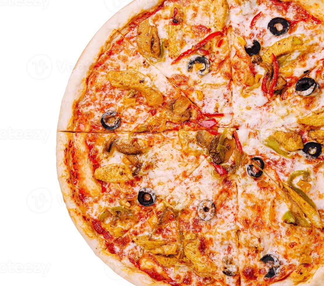 Delicious pizza topped with olives and peppers served on a plate photo