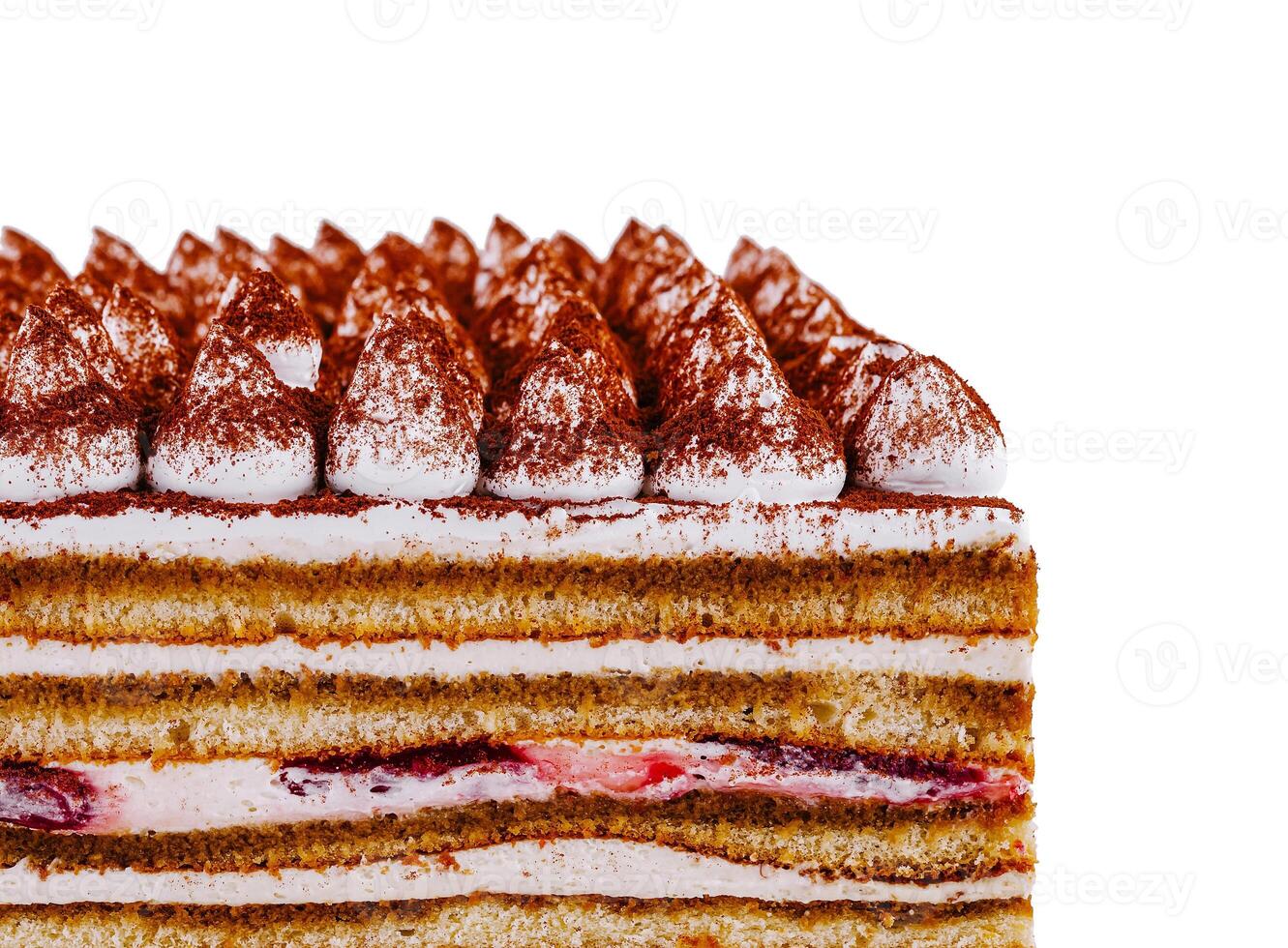 Delicious tiramisu cake with layers of cream and strawberries isolated on white photo