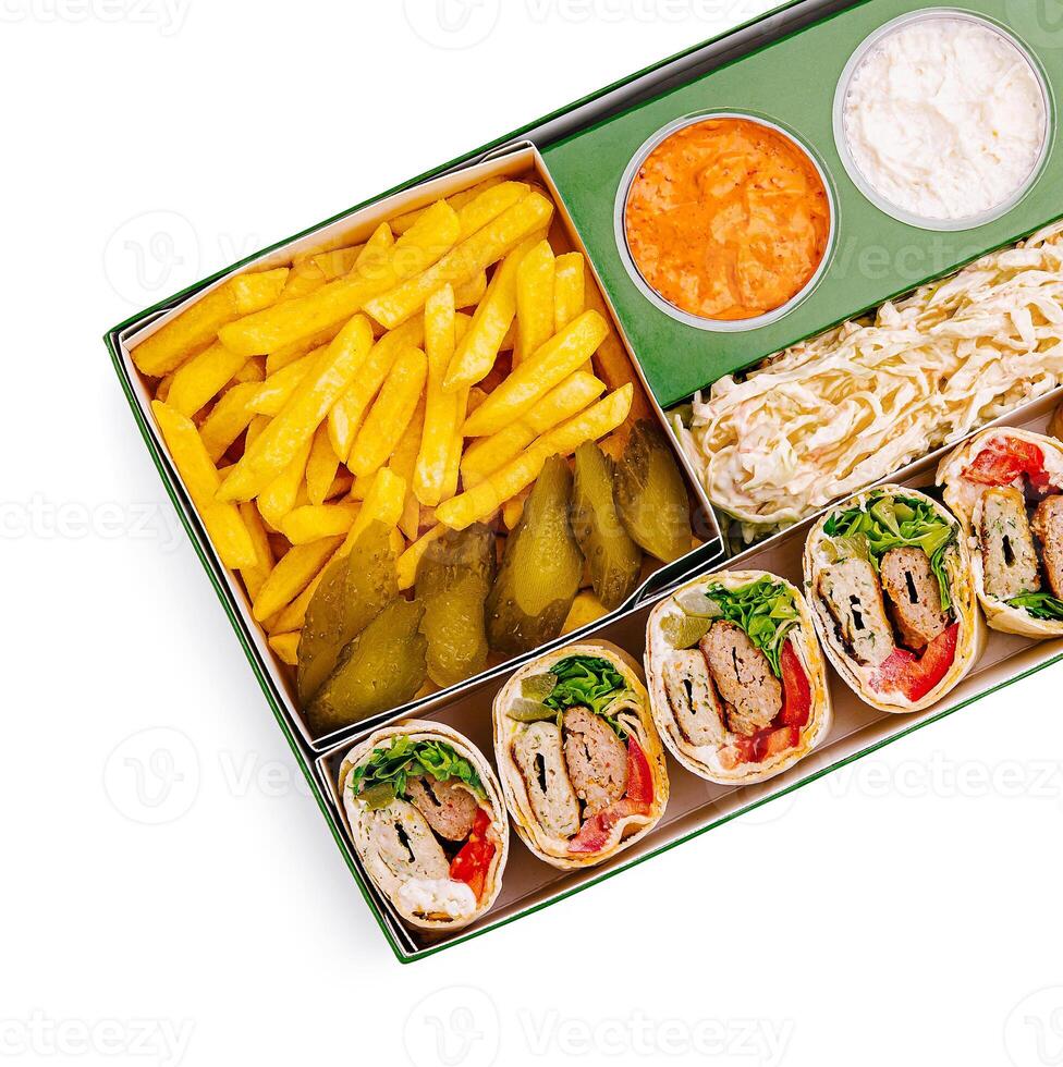 Delicious wrap platter with fries and dips ready to enjoy photo