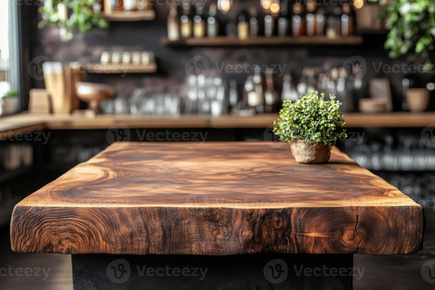 Empty wooden table with blurred bar background showing alcohol bottles and shelves photo