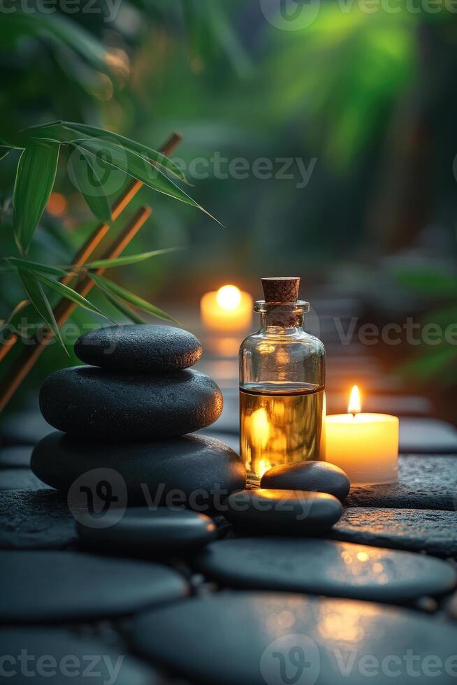 Relaxing spa scene with essential oil and stones . photo