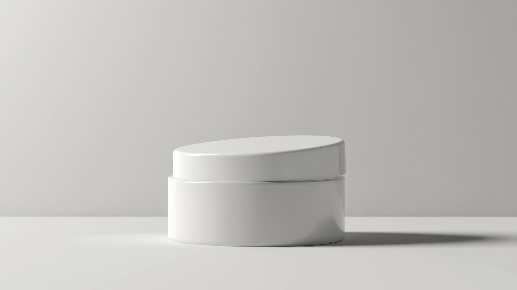 A white container with a lid sitting on a table photo