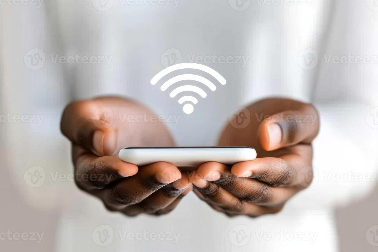 Person holding smartphone with holographic Wi-Fi symbol, representing advanced wireless connectivity in modern technology photo