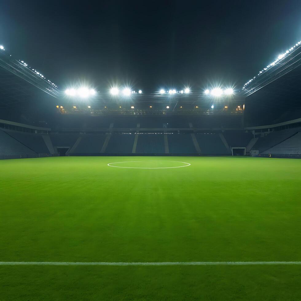 Empty Soccer Stadium at Night with Bright Lights Illuminating the Lush Green Field photo