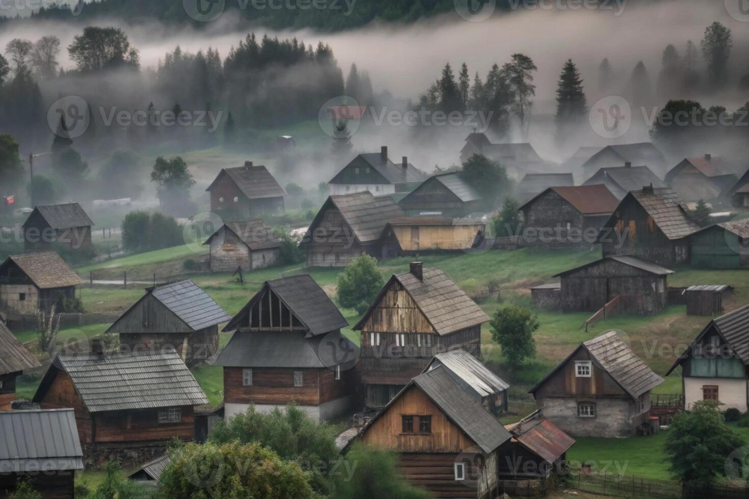 A village in the fog with many wooden houses photo