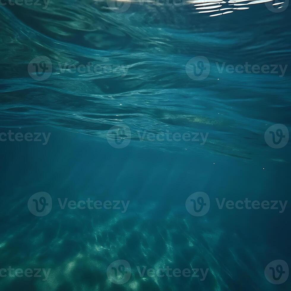 Stunning Underwater Scene of Deep Teal Ocean Water with Sunlight Rays photo