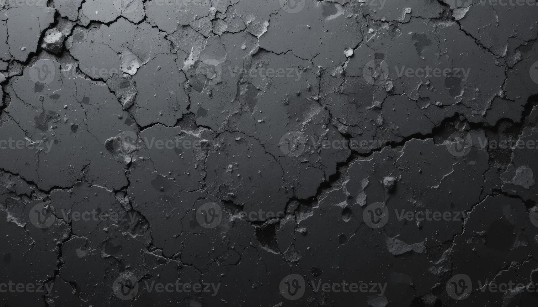 A cracked, textured black surface revealing depth and character, ideal for abstract art backgrounds or design elements in various creative projects. photo
