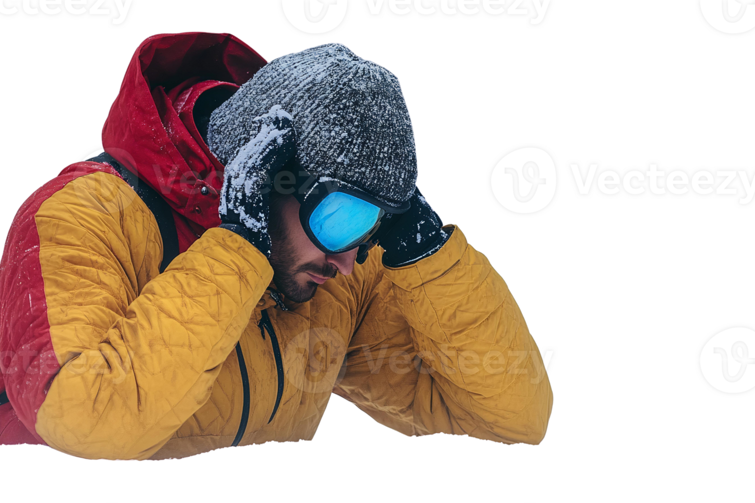 Man in yellow and red winter jacket with snow on hat and goggles on transparent background png