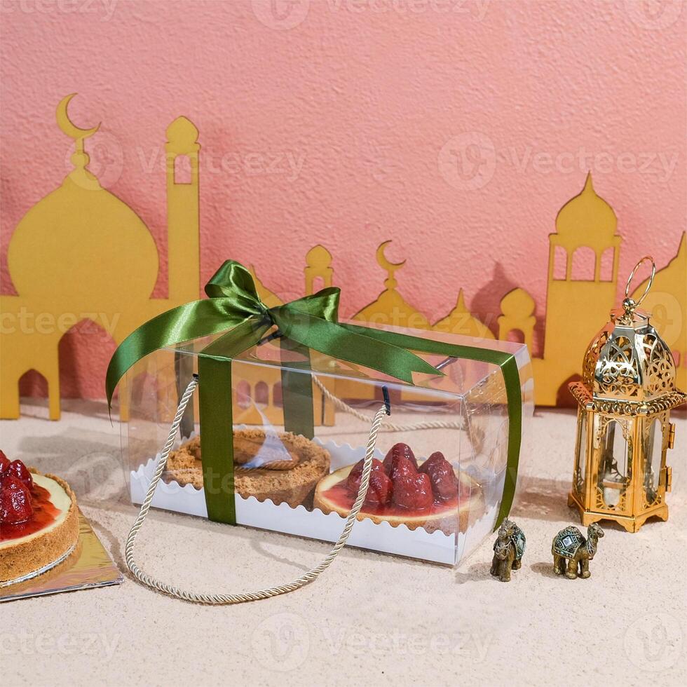 EID Mubarak and Ramadan Hampers With Green Ribbon on Top photo