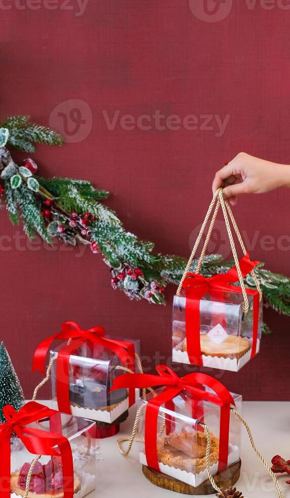 LAdies Hand Holding Christmas Box Hampers photo