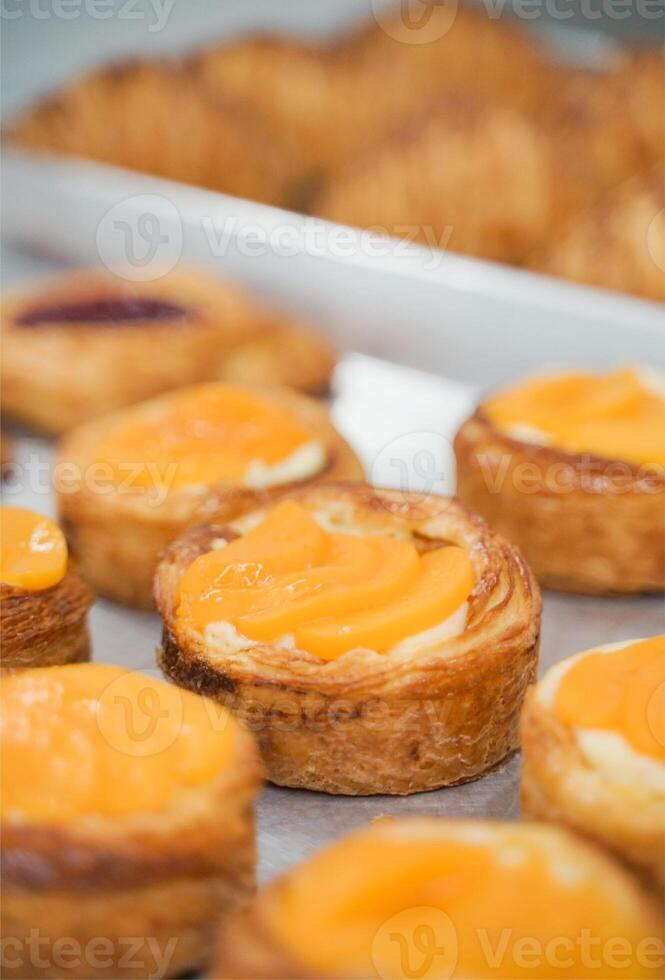 Close Up Food Photography of Peach Danish Pastry photo