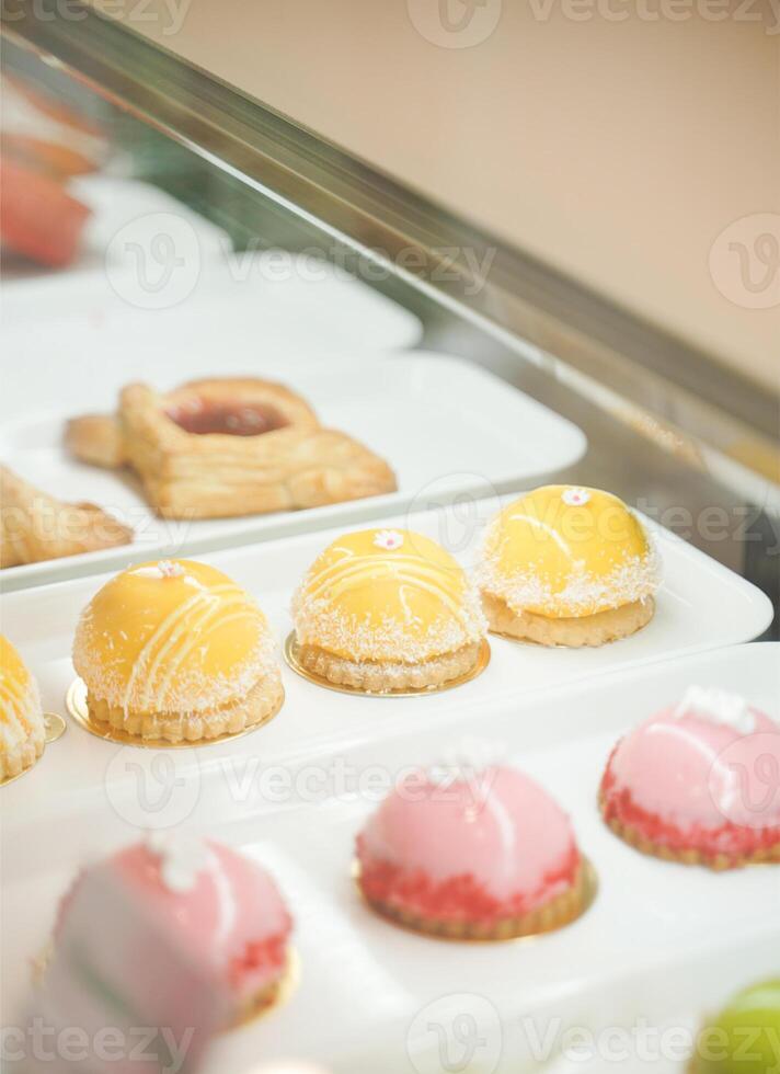 Photography of Dooms Cakes Inside The Display Case photo