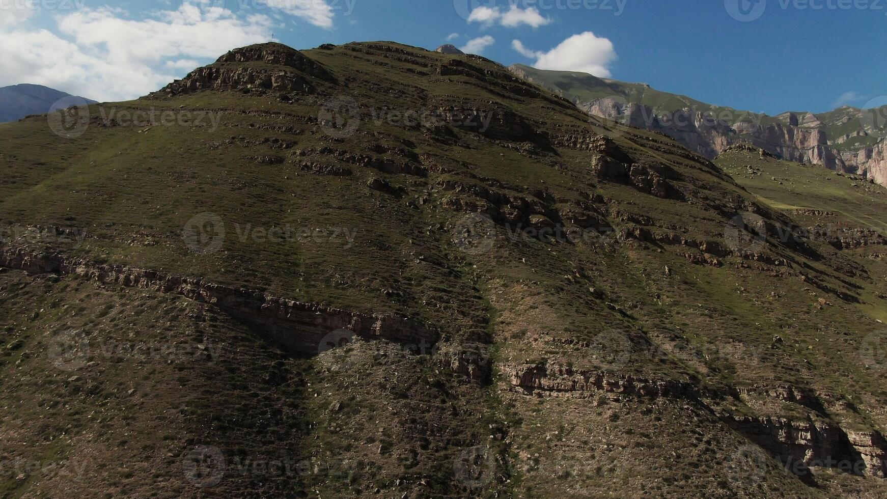 A mountain with a valley in the middle photo