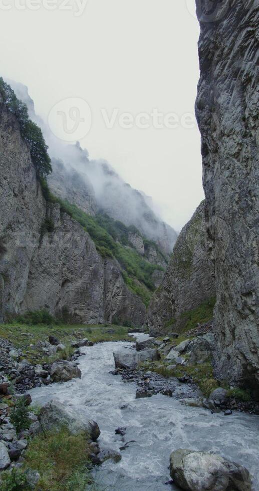A river flowing through a rocky canyon photo