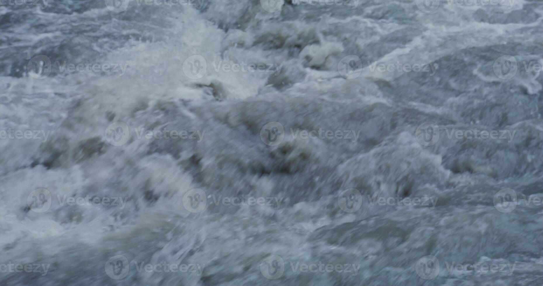 Seething mountain river close up. Russia. photo