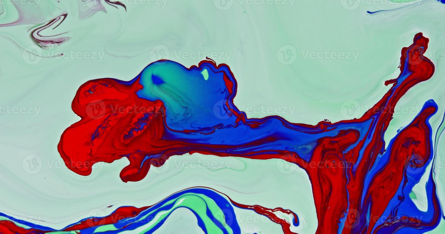 A painting of a red, blue, and green bird photo