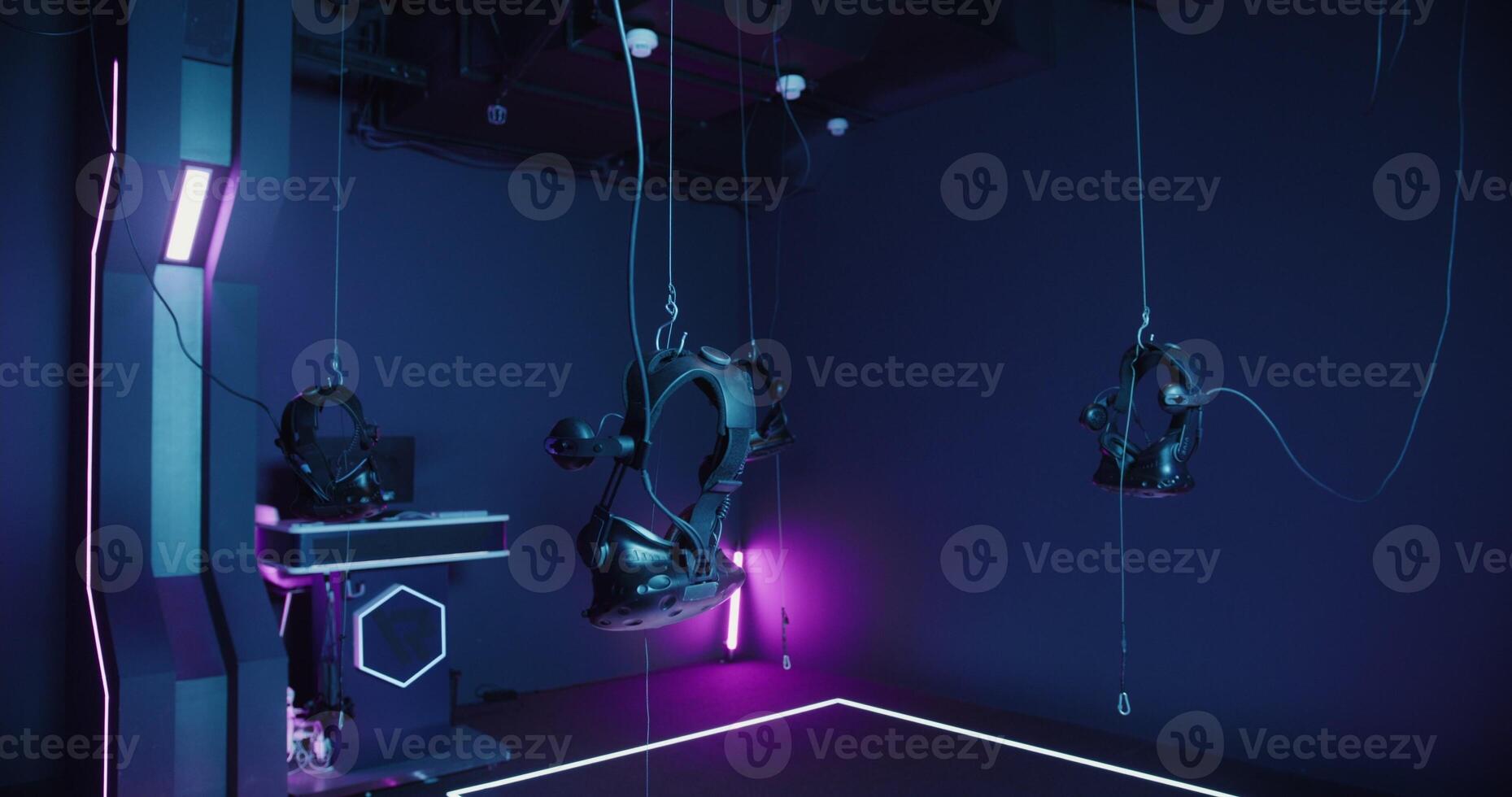 Empty modern comfortable room for virtual reality games, equipped with virtual reality glasses and the necessary equipment photo