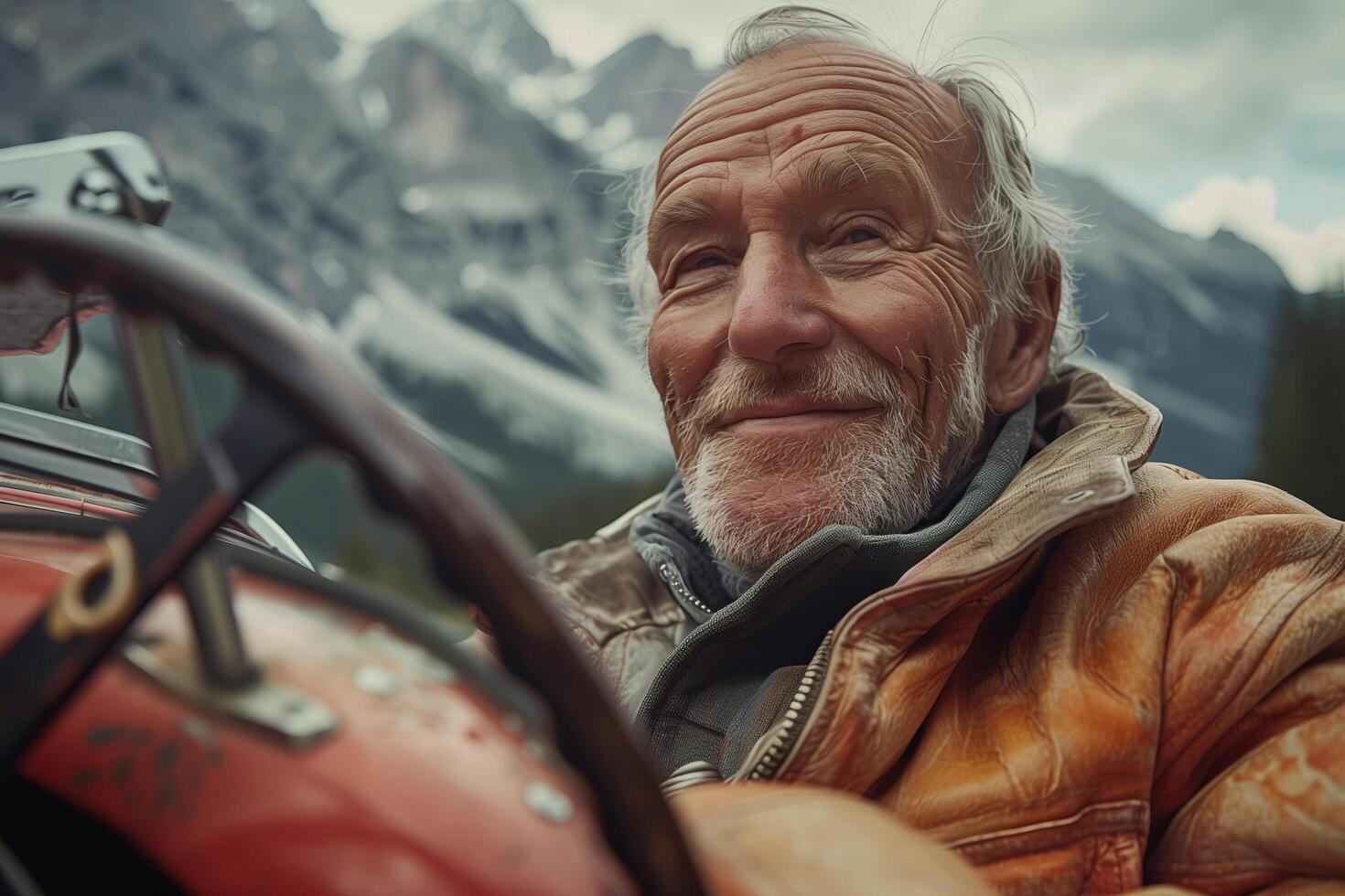 An older man is sitting in a vintage car photo