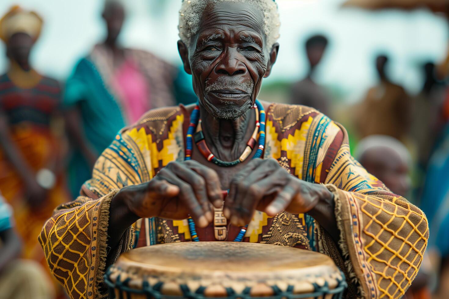 An old man playing a drum in front of a crowd photo