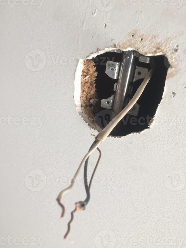 Wiring a Ceiling Fan Installation in a Home Living Room photo