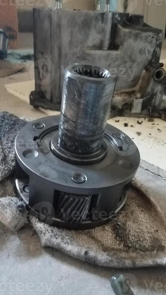 Using Two Screwdrivers to Remove a Snap Ring on a Transfer Case photo