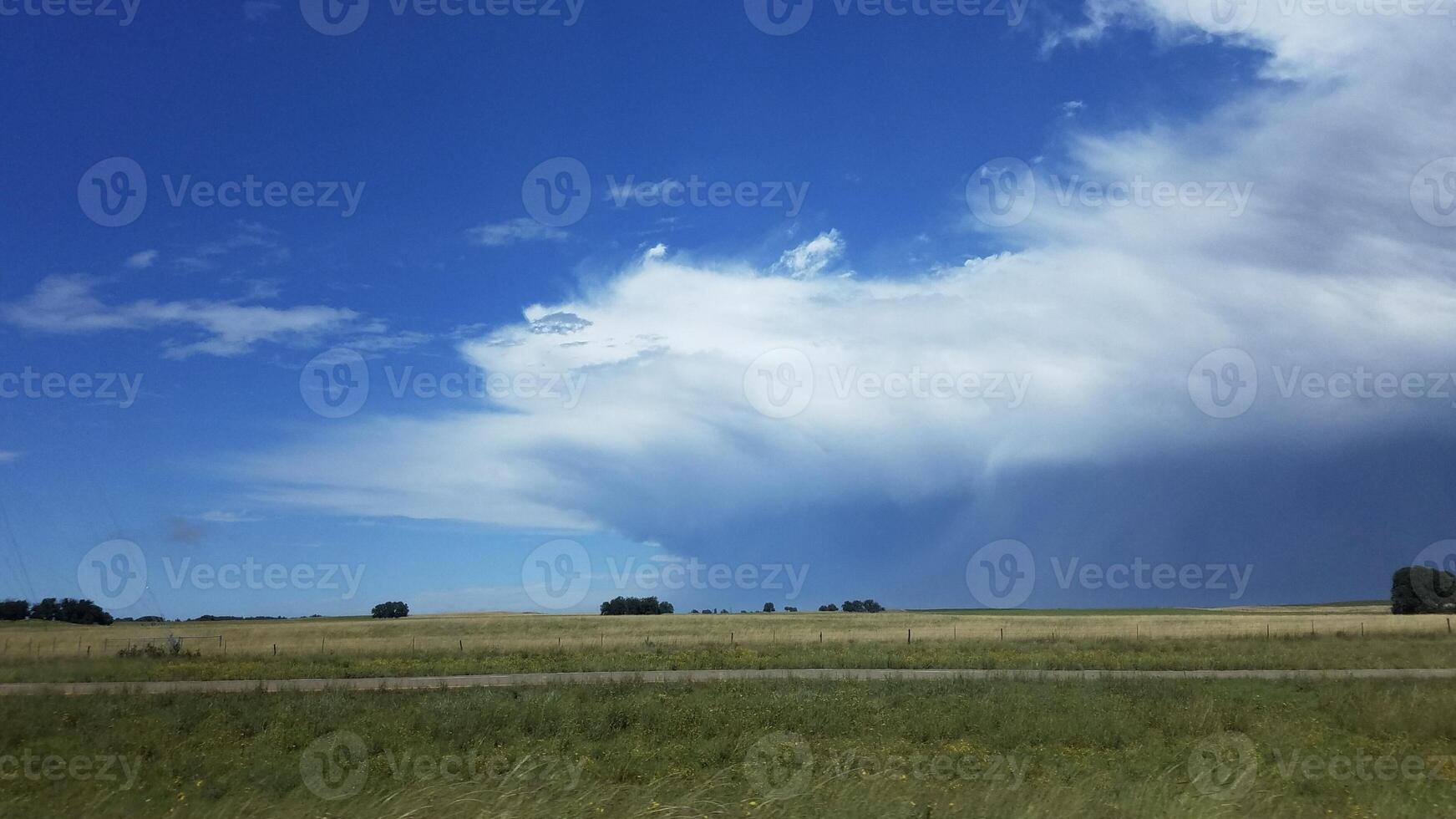 Storm Clouds Forming Over Flat Prairie Land, Midwest Rural Landscape photo