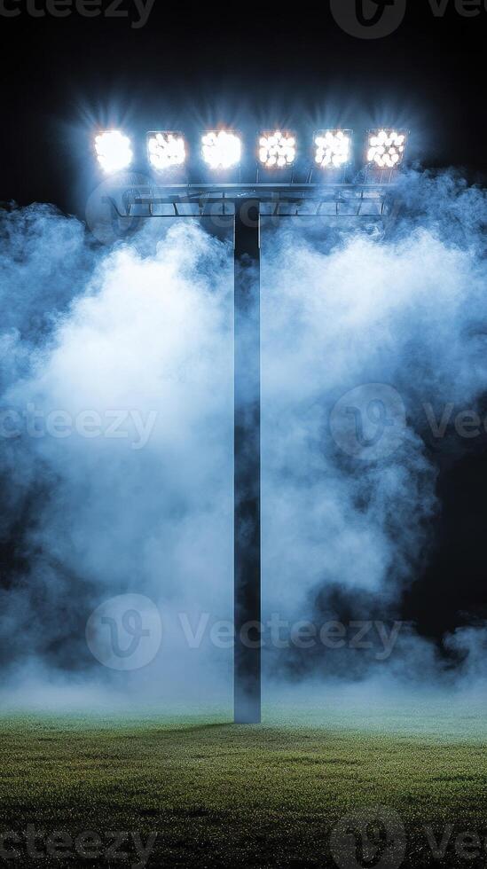 Bright Stadium Lights in Blue Night Fog photo