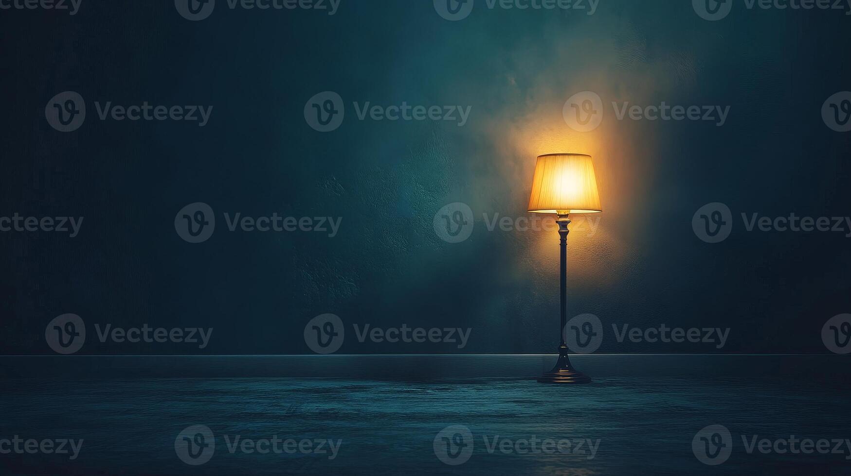 Warm glow of a single floor lamp in dark room photo