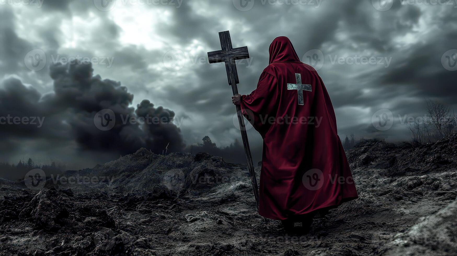 A man in a red cloak with a cross on his back photo