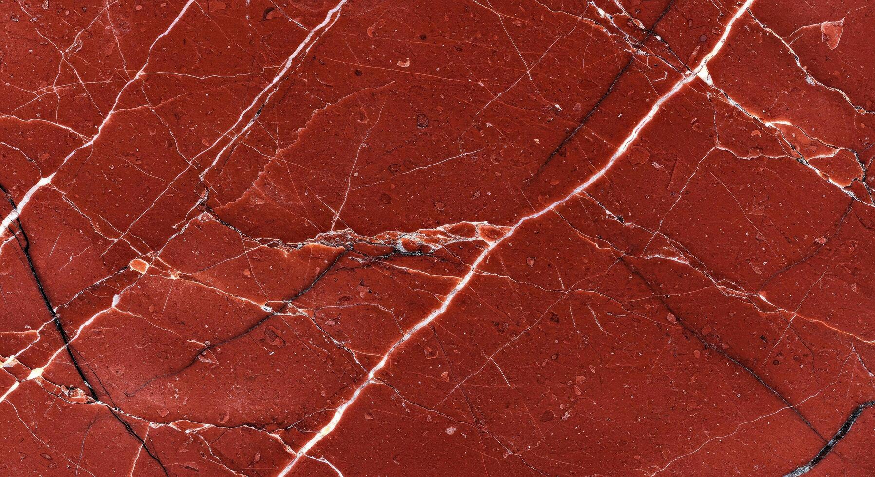 A close up of a red marble surface photo