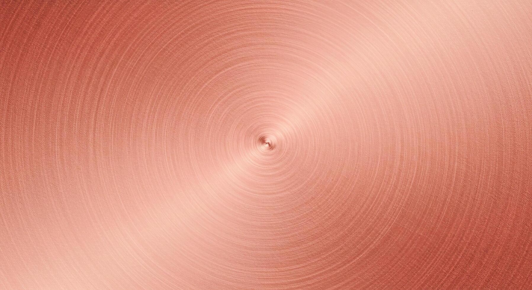 A copper metal texture background with a circular pattern photo