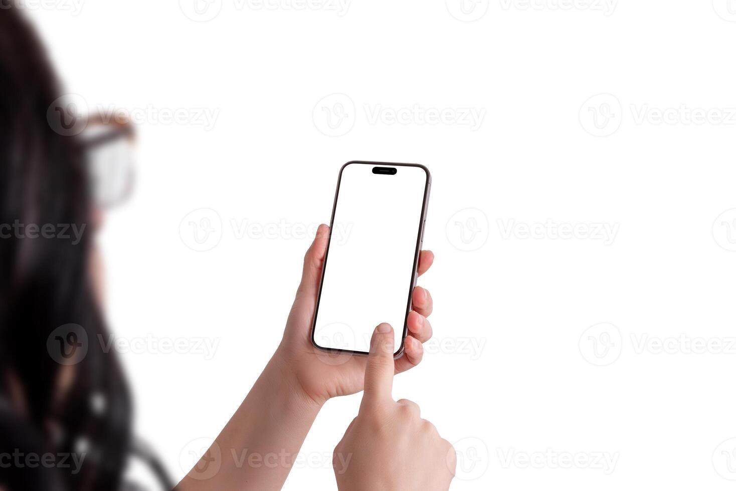 Woman holding a modern smartphone in her left hand while tapping the screen with her right hand, over the shoulder view, isolated display for mockup photo