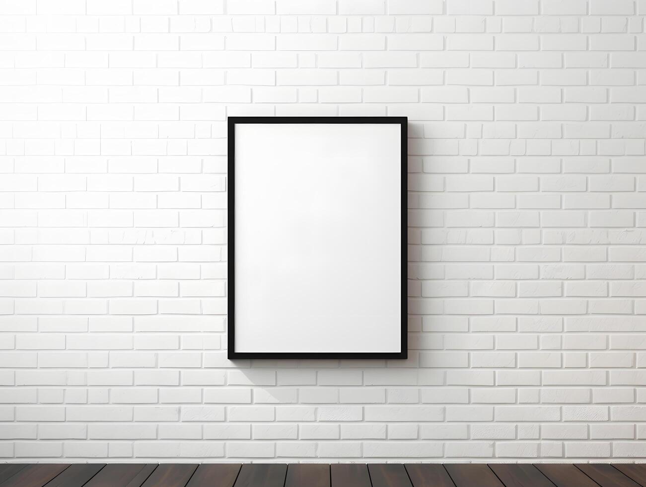 A blank white frame hanging on a brick wall photo