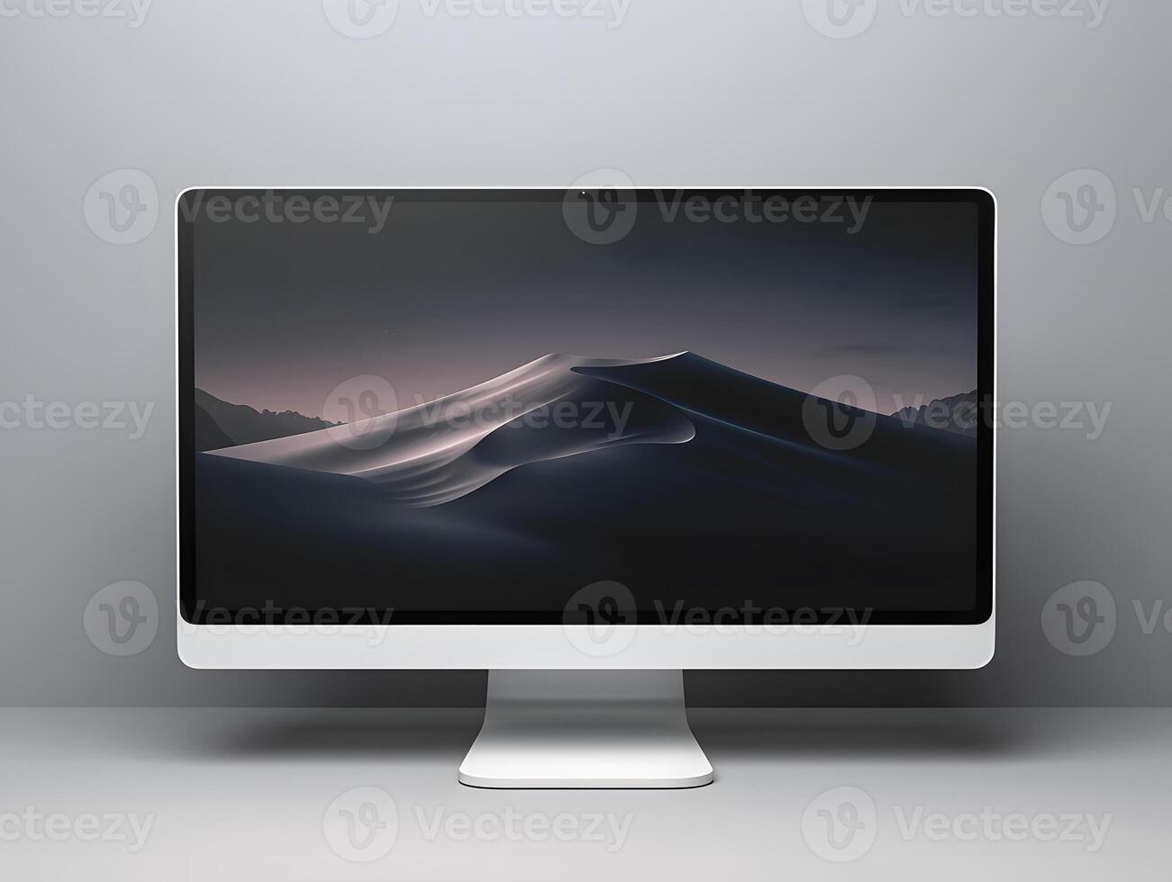 A computer monitor with a mountain scene on it photo