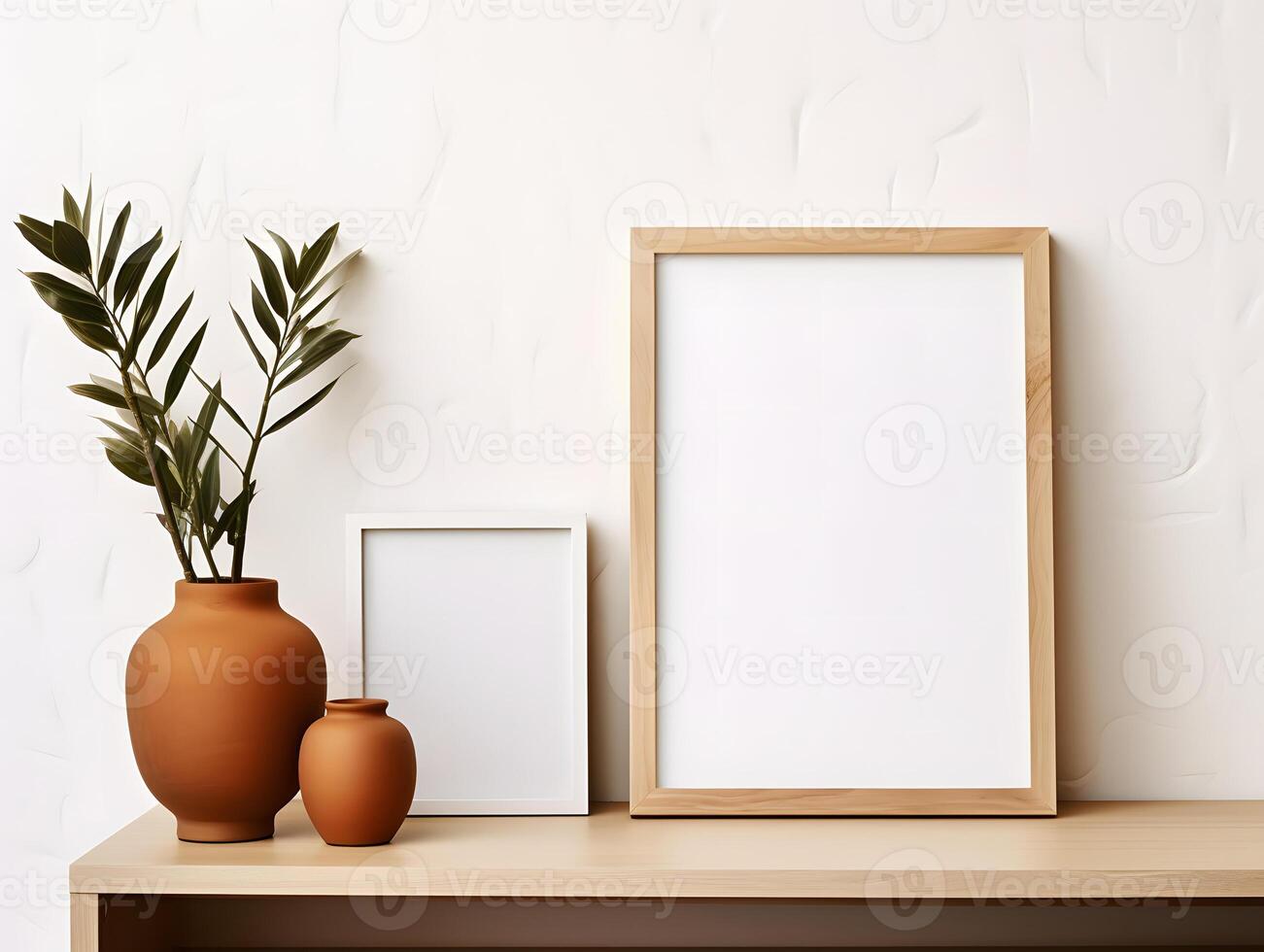 Mockup of empty frame on a shelf with vases and plant photo