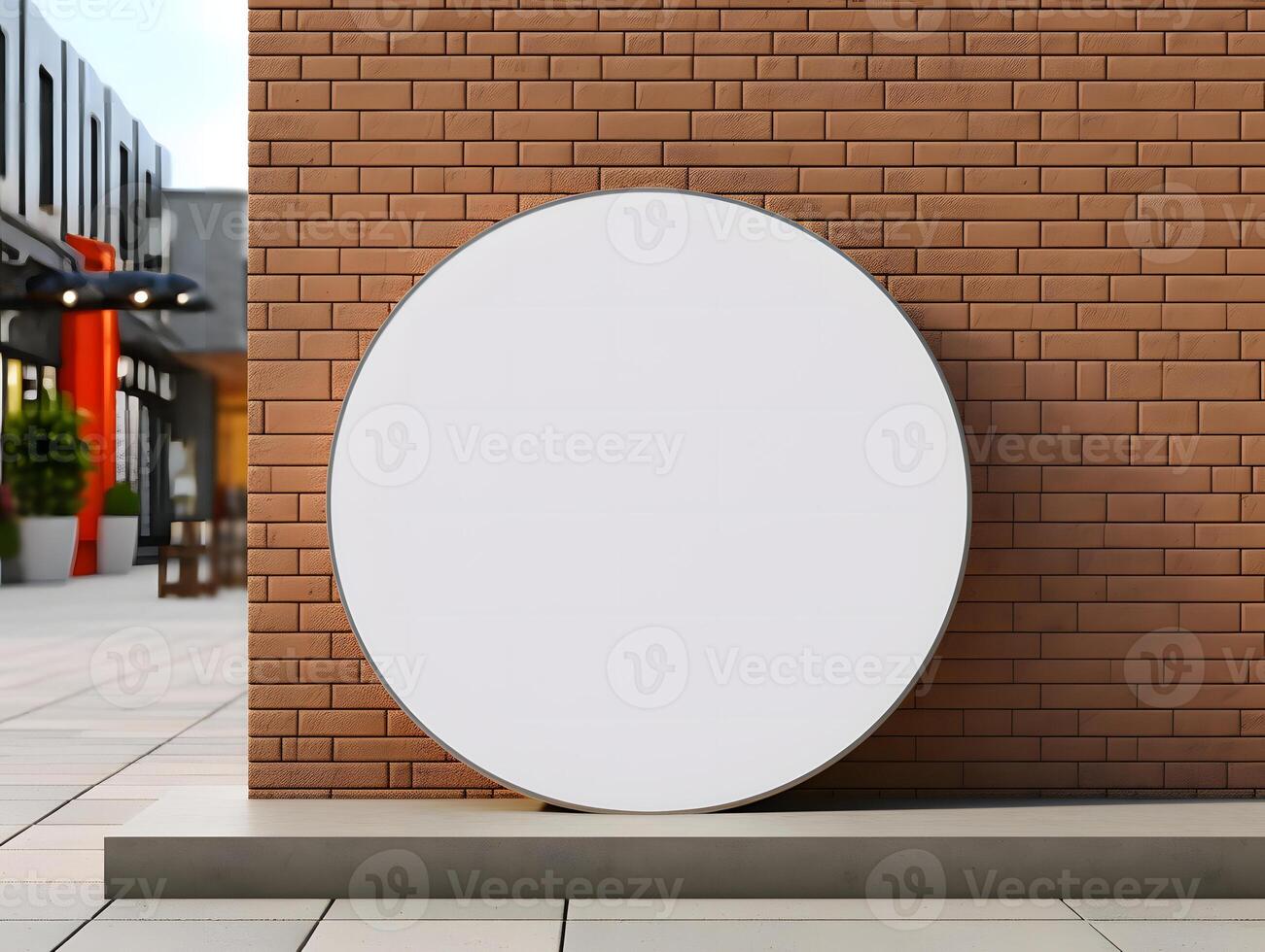 A white round sign on a brick wall photo
