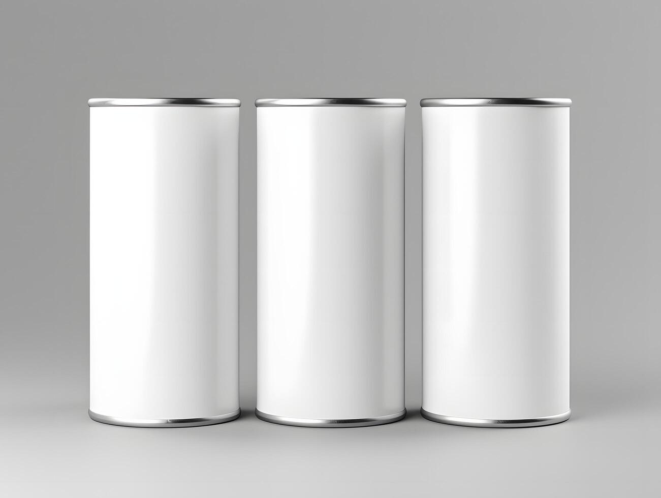 Three blank white aluminum cans mockup for branding and packaging design photo