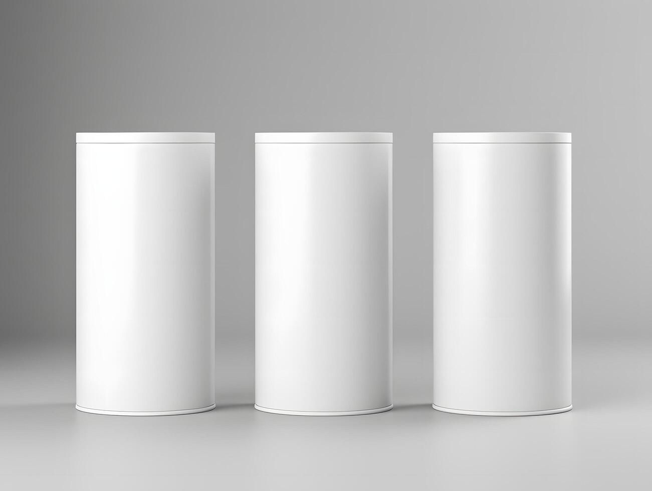 Three white empty containers on a gray background photo