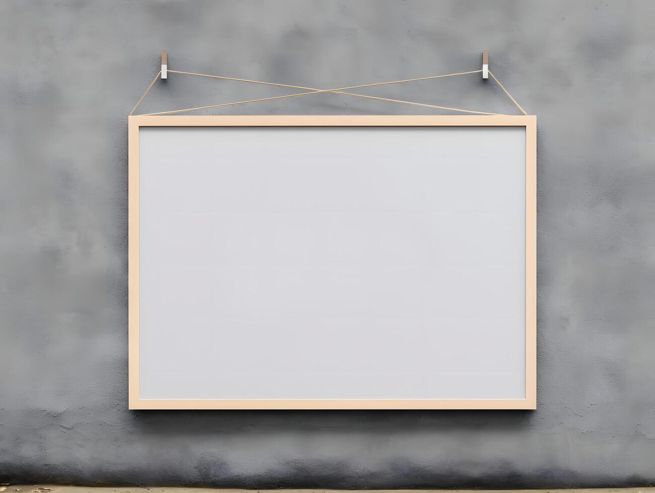 Blank white frame hanging on a wall with a rope photo