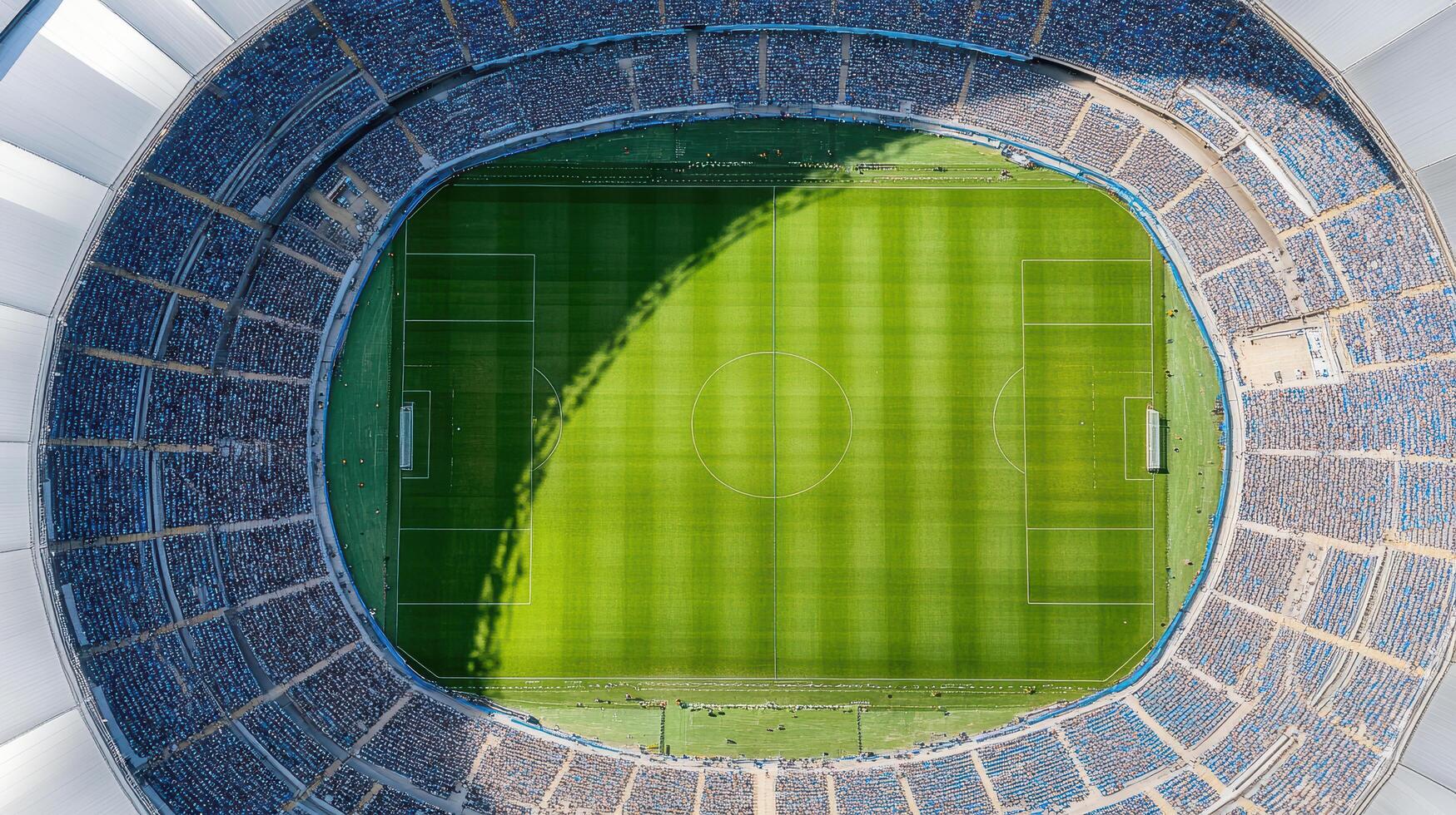 Aerial view of large sports stadium filled with fans during game photo