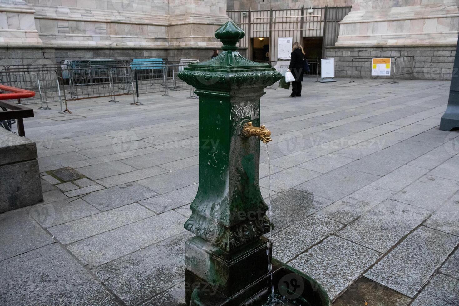 The constant waste of drinking water from a faucet in an Italian city photo