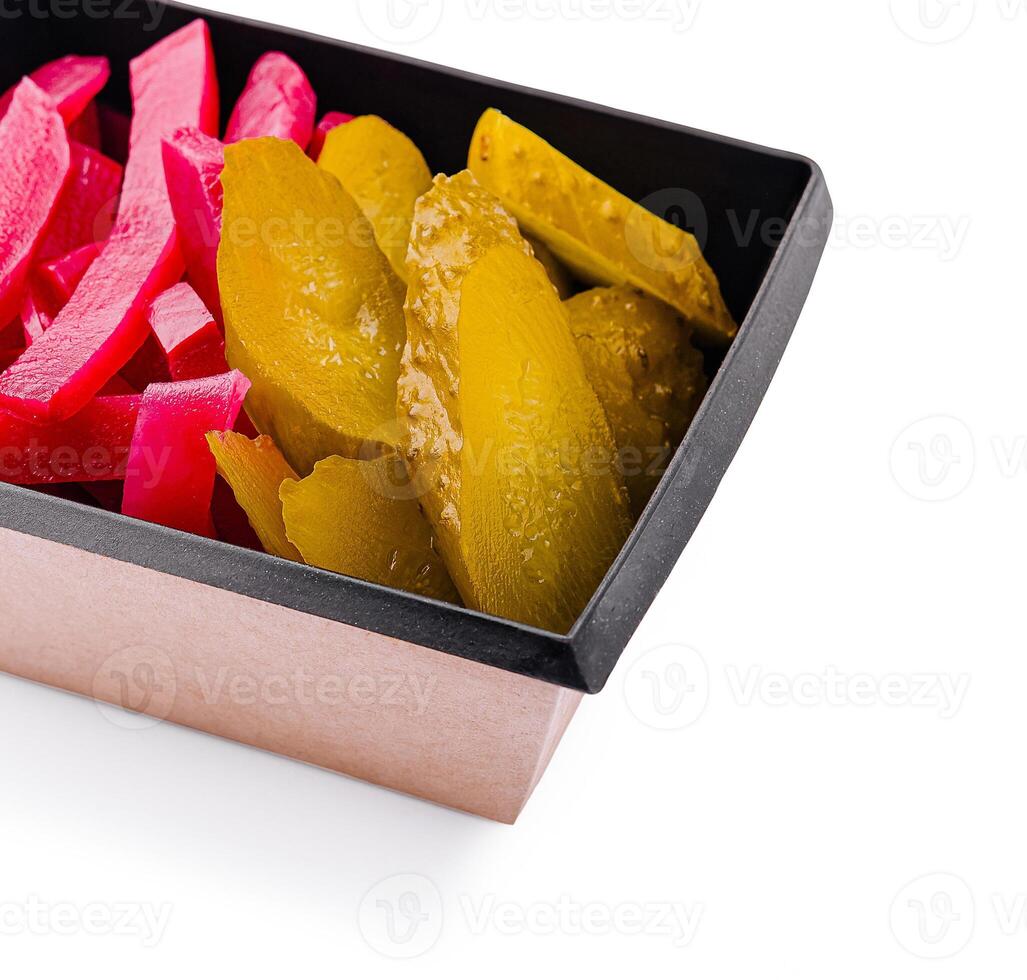 Colorful assortment of pickled vegetables in a container photo