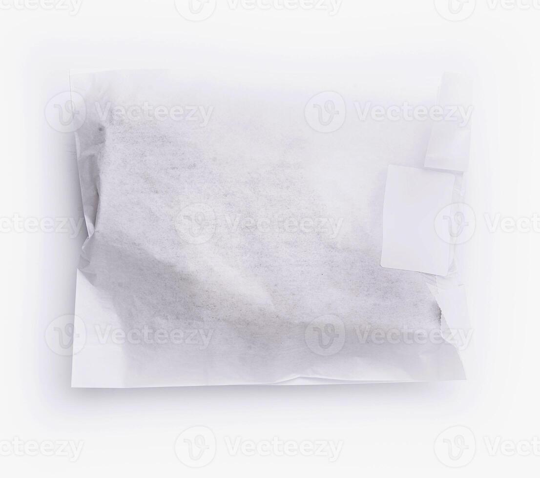 close up Crumpled white paper bag with blank label for branding mockup photo
