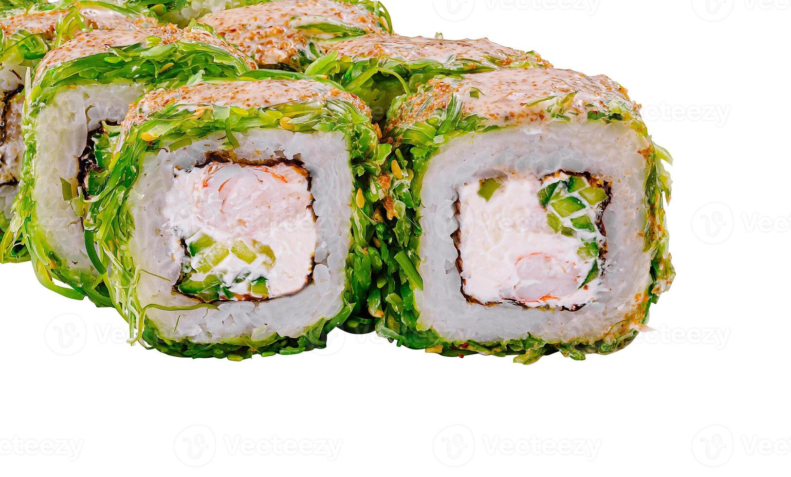 Close up Green dragon sushi rolls with shrimp and chuka seaweed lying on white background photo