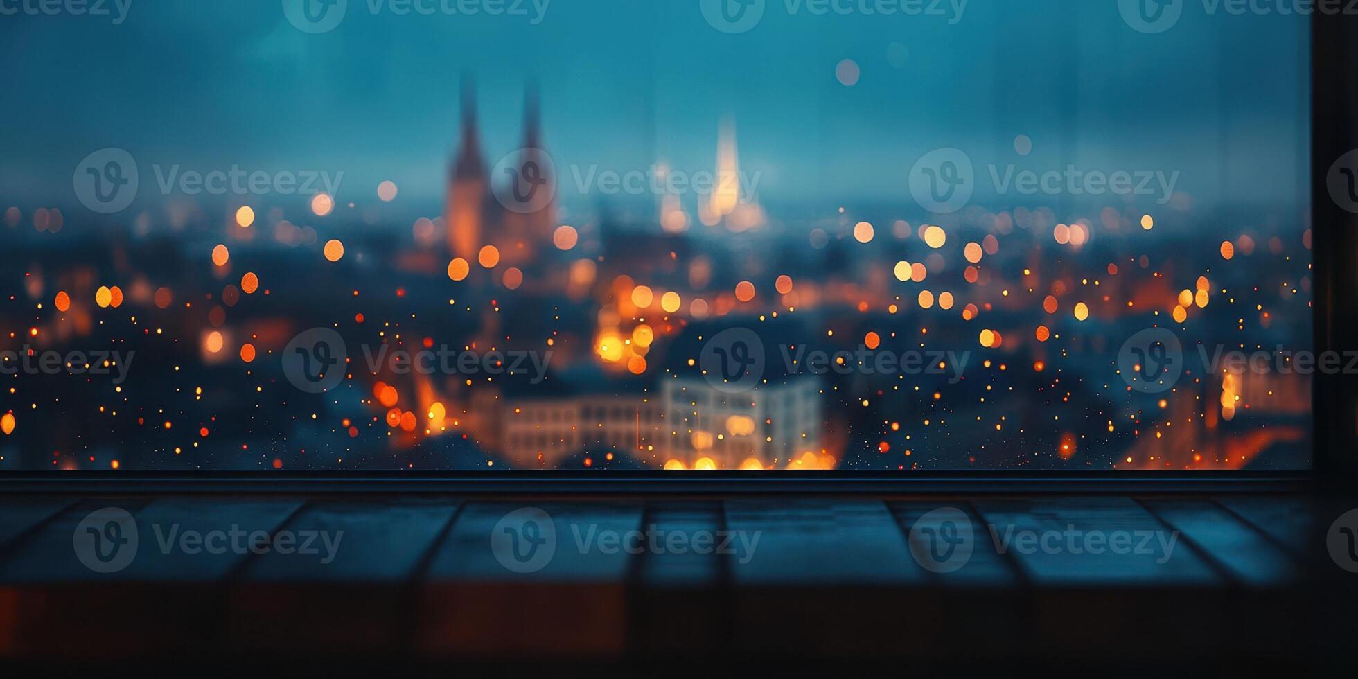 Nighttime cityscape with raindrop reflections from a window overlooking a vibrant urban skyline photo