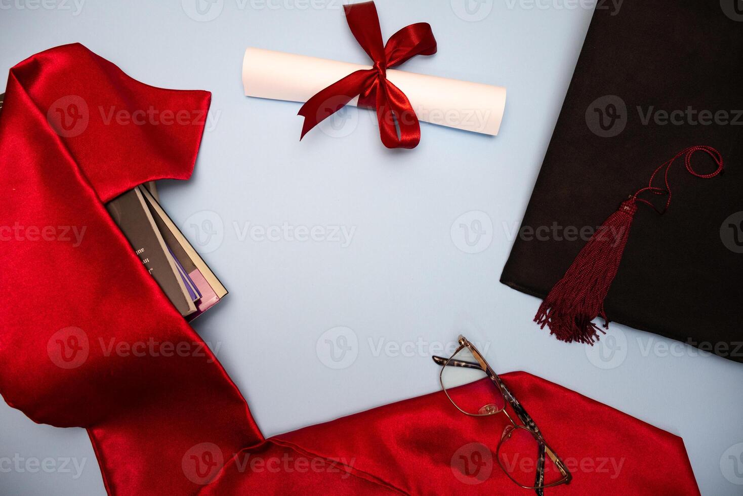 Graduation background with graduation hat diploma with red ribbon graduation stole photo