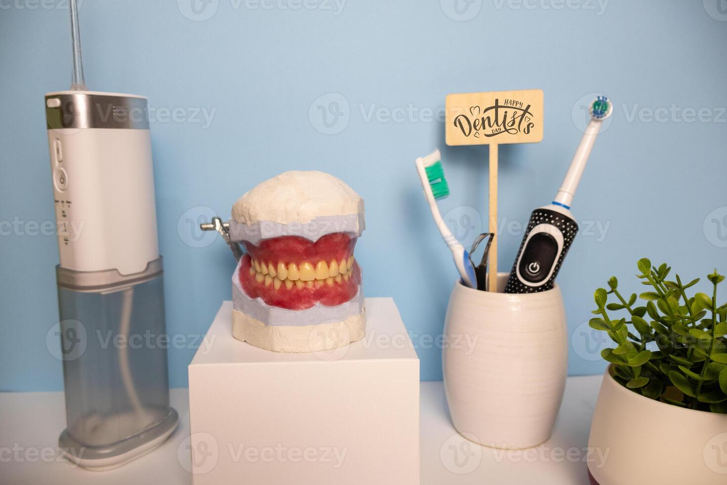 Happy Dentists day background with oral hygiene tools photo