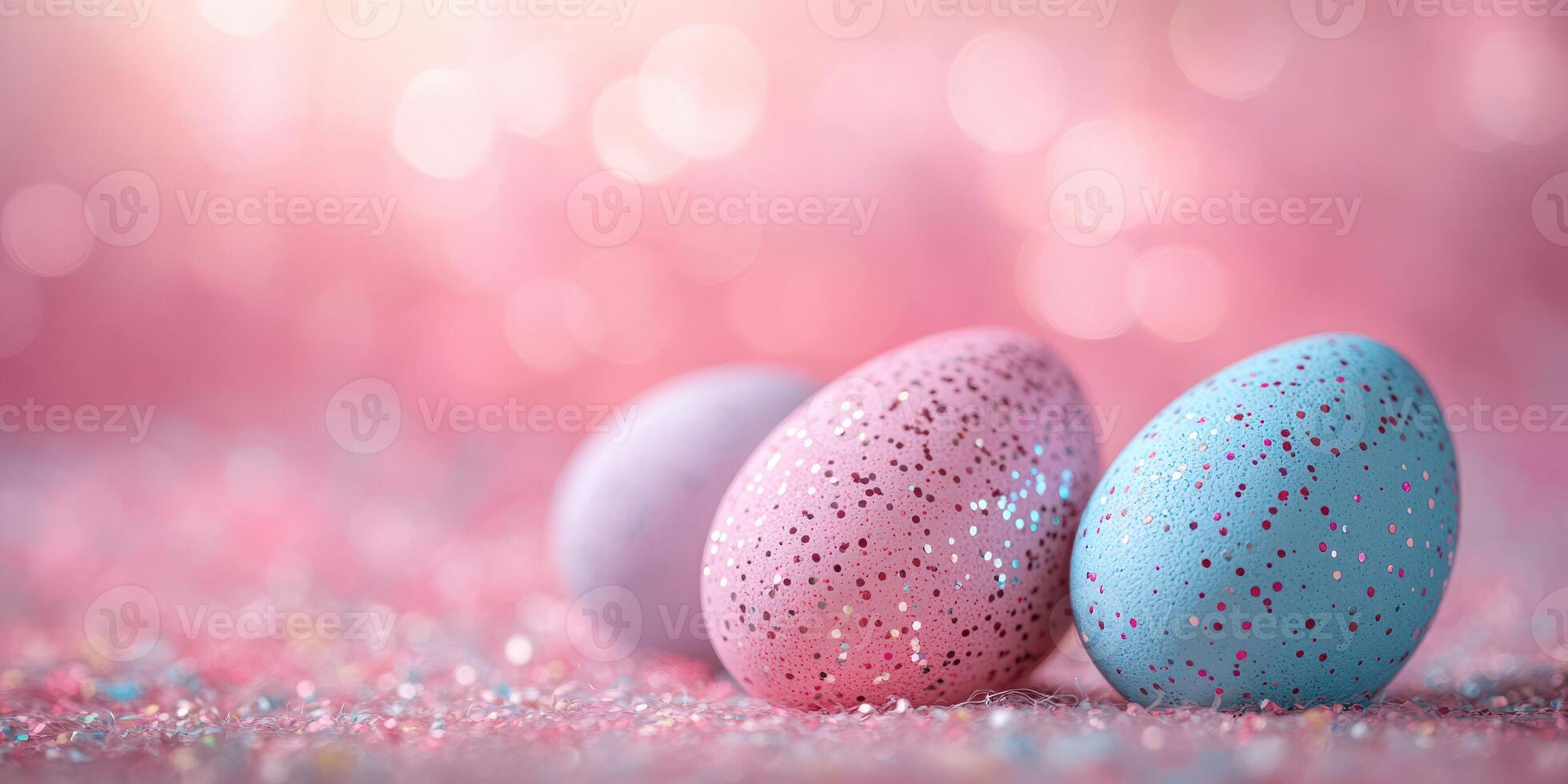 Colorful glittery Easter eggs arranged against a sparkling pink background during spring celebrations photo