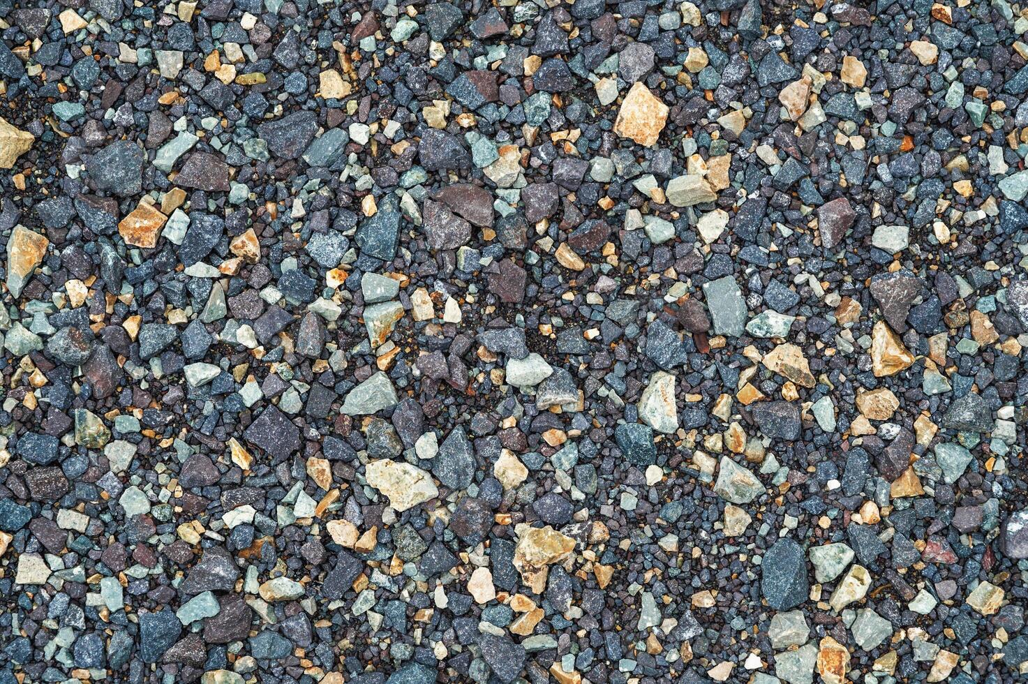 Crushed dark grey gravel stone texture horizontal photo