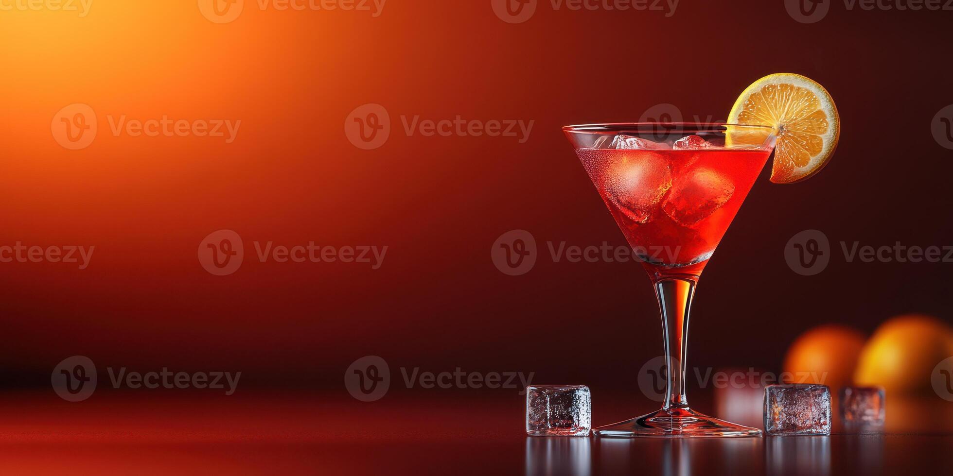 Refreshing cocktail with ice and lemon slice during a vibrant sunset glow photo